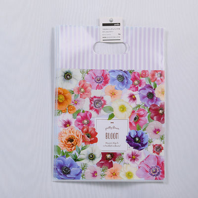 Waterproof Die Cut Handle Plastic Bags 30x40cm Heavy Duty Handle Bags 5kg Capacity